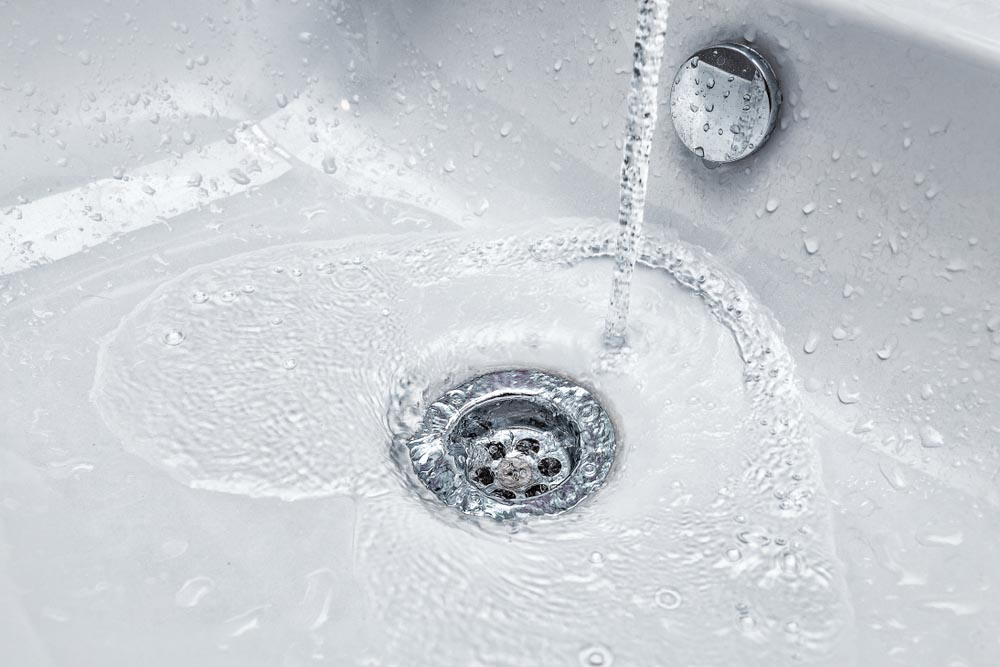 water flows into the sink Bellevue, WA