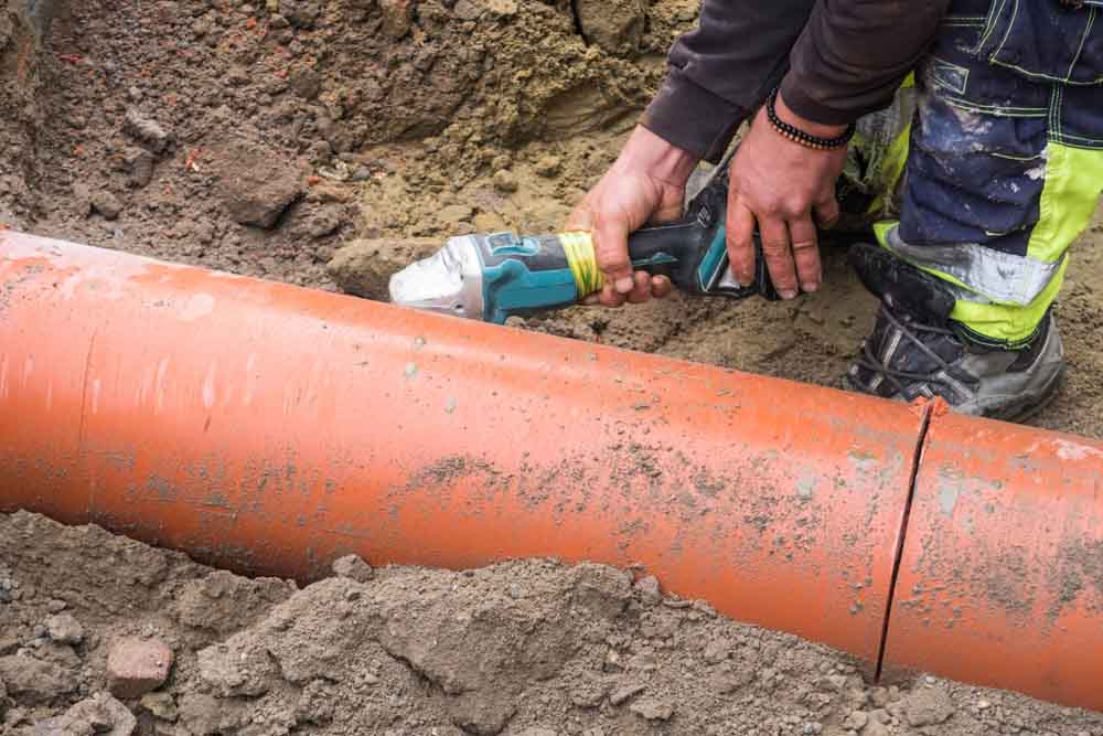 technicians repairing a sewer line Seattle, WA